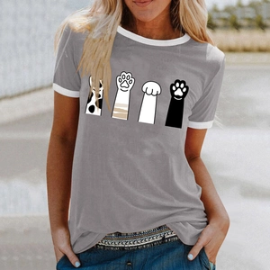 Close-up of gray short-sleeve T-shirt featuring four cute cartoon cat paw prints