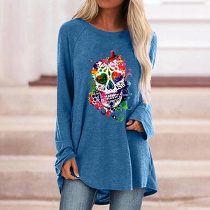 Detail of artistic sugar skull print on blue oversized long sleeve Halloween t-shirt