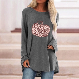 Detail of grey oversized long sleeve tee featuring leopard print pumpkin graphic