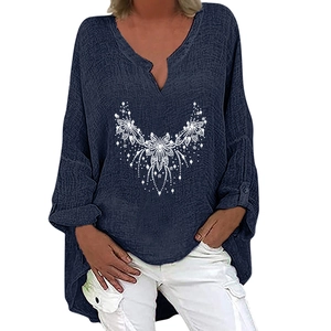Detail of V-neck long sleeve navy top with white mandala print and asymmetric hem