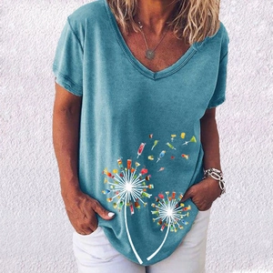 Detail of elegant V-neck t-shirt in dusty blue with creative dandelion drink print