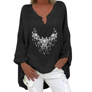 Detail of V-neck long sleeve top featuring white snowflake pattern and cargo pants set