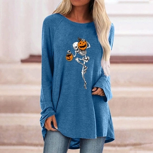 Detail of Halloween pumpkin and skeleton print on loose blue long sleeve t-shirt