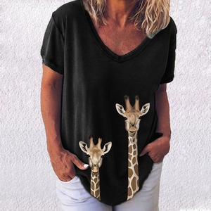 Detail showing the deep V-neckline and creative giraffe print on black cotton T-shirt