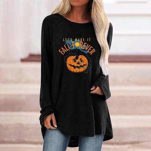 Detail of loose black Halloween long sleeve shirt with pumpkin and moon print