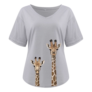 Detail shot of the V-neckline and inner size M label on a grey giraffe print t-shirt
