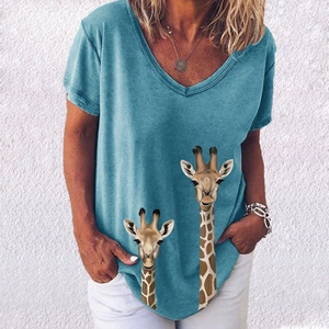 Detail of V-neck summer T-shirt featuring cute giraffe prints and textured blue fabric
