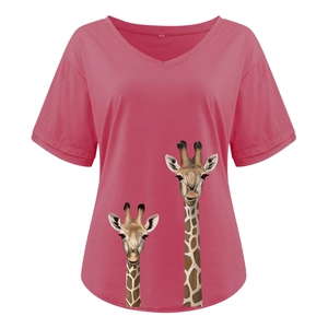 Detail of creative giraffe print on elegant V-neck short sleeve T-shirt in magenta