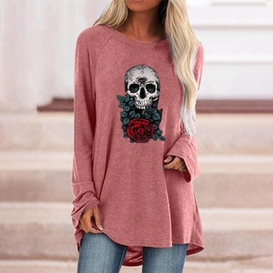 Detail of gothic skull and roses print on casual dark pink long sleeve t-shirt