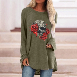 Detail of army green Gothic t-shirt with skull and red roses print on soft fabric