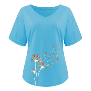 Detail of light blue V-neck T-shirt showing artistic dandelion pattern made of tiny cats