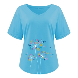 Detail of V-neckline and colorful paw print dandelion pattern on sky blue t-shirt