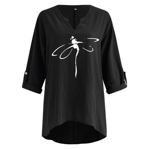 Detail of V-neck cotton linen blouse with dragonfly print and rolled sleeves