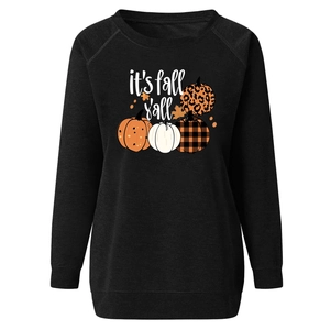Detail of fall pumpkin prints and it's fall y'all text on black crewneck sweatshirt
