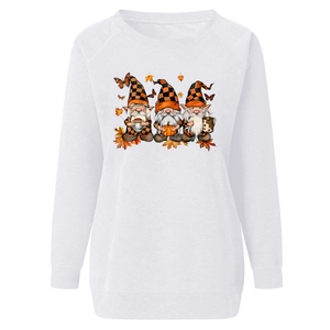 Close-up of autumn gnomes print with maple leaves on a white crewneck sweatshirt