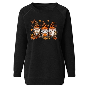 Detailed close-up of Halloween gnome graphics on black long sleeve crewneck sweatshirt