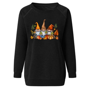 Detail of raglan sleeves and festive dwarf print on black long-sleeve sweatshirt