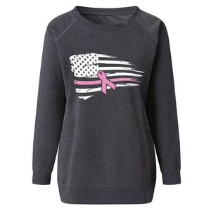 Detail of soft charcoal grey sweatshirt showing rib-knit cuffs and breast cancer ribbon print