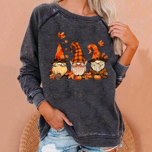 Detail view of Halloween gnomes and pumpkin print on grey raglan sleeve sweatshirt