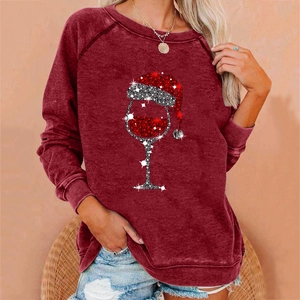 Women's festive burgundy sweatshirt with Christmas wine glass print and raglan sleeves