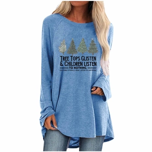 Detail of Christmas tree print on blue long sleeve tee with humorous holiday slogan