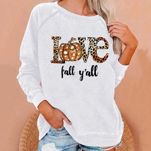 Close-up of Halloween sweatshirt with pumpkin print and stylish fall y'all text for women