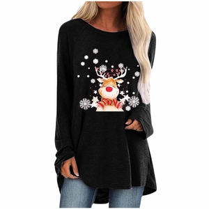 Close-up of a Christmas reindeer print and snowflake patterns on a black long sleeve tee