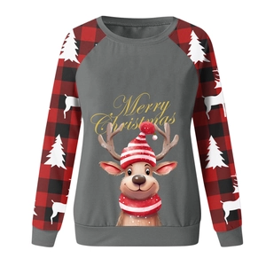 Close-up of Christmas sweatshirt featuring Merry Christmas print and reindeer motif