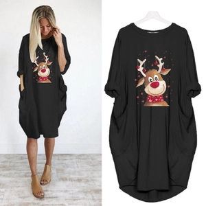 Close-up of black Christmas reindeer print dress featuring functional side pockets
