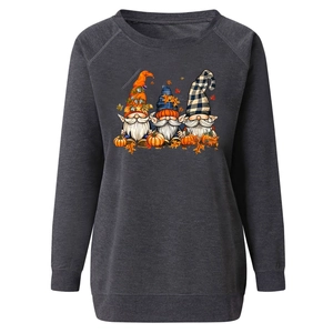 Detail of three festive gnomes with pumpkins print on a dark grey autumn sweatshirt