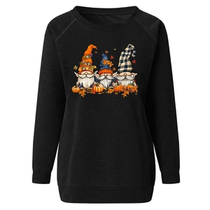Detail of Halloween gnome print on loose black raglan sleeve sweatshirt for women