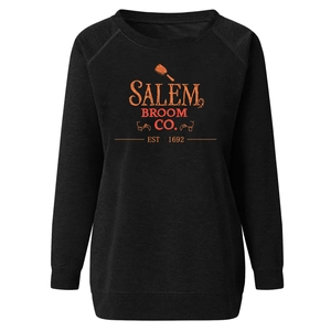 Detail of Salem Broom Co. print on black cotton blend sweatshirt with raglan sleeves