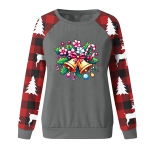 Detailed Christmas sweatshirt featuring festive bell prints and red plaid raglan sleeves