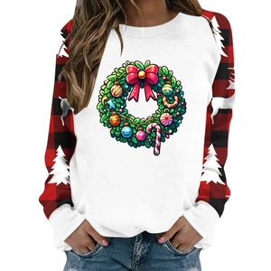 Detail of Christmas raglan sweatshirt with festive wreath print and red black plaid sleeves