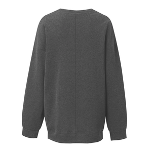 Detail view of the charcoal gray sweatshirt's ribbed hem and vertical back seam detail