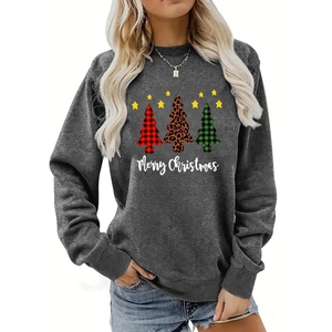 Detail of Christmas tree prints and Merry Christmas text on dark gray sweatshirt