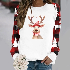Close-up of reindeer print and red buffalo plaid raglan sleeves on Christmas sweatshirt