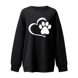 Detailed close-up of the heart and paw print silk screen printing on a black cotton sweatshirt