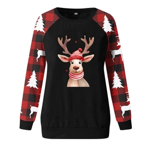 Detail view of Christmas sweatshirt featuring reindeer print and red plaid sleeves