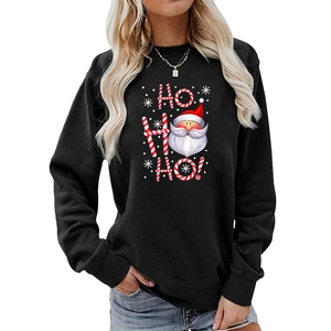Close-up of women's black Christmas sweatshirt with Santa and HO HO HO festive print