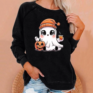 Close-up of black sweatshirt featuring a cute Halloween ghost print and raglan sleeves