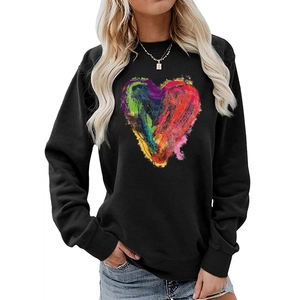 Detail of artistic colorful heart print on black crewneck sweatshirt for women