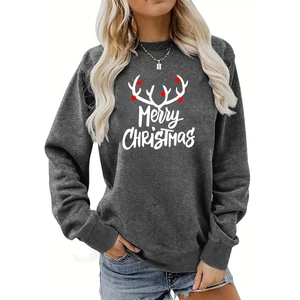 Detail of Christmas reindeer antlers and Merry Christmas print on dark grey sweatshirt