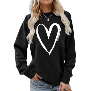 Detailed view of the white heart print and round neck on the black casual sweatshirt