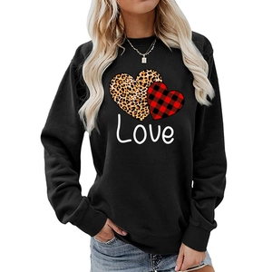 Detail of leopard and plaid double heart print with Love text on black sweatshirt