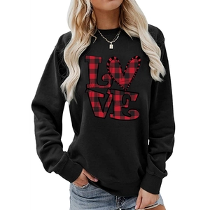 Detail of loose-fit black sweatshirt with red buffalo plaid LOVE print and heart shape