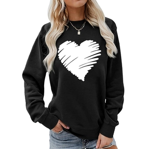 Detail shot of black heart-print sweatshirt with crew neck and drop shoulder design