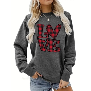 Detail of red buffalo plaid heart print and LOVE lettering on gray long sleeve sweatshirt