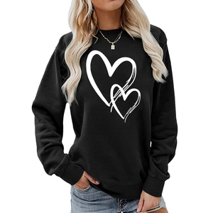 Women's black oversized crewneck sweatshirt featuring white heart print with drop shoulders