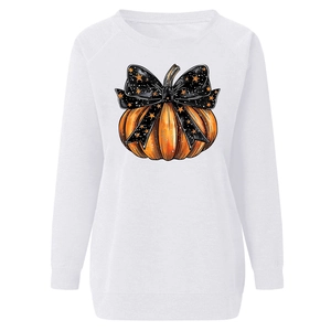 Detail of Halloween pumpkin print with bow on white long sleeve sweatshirt for women